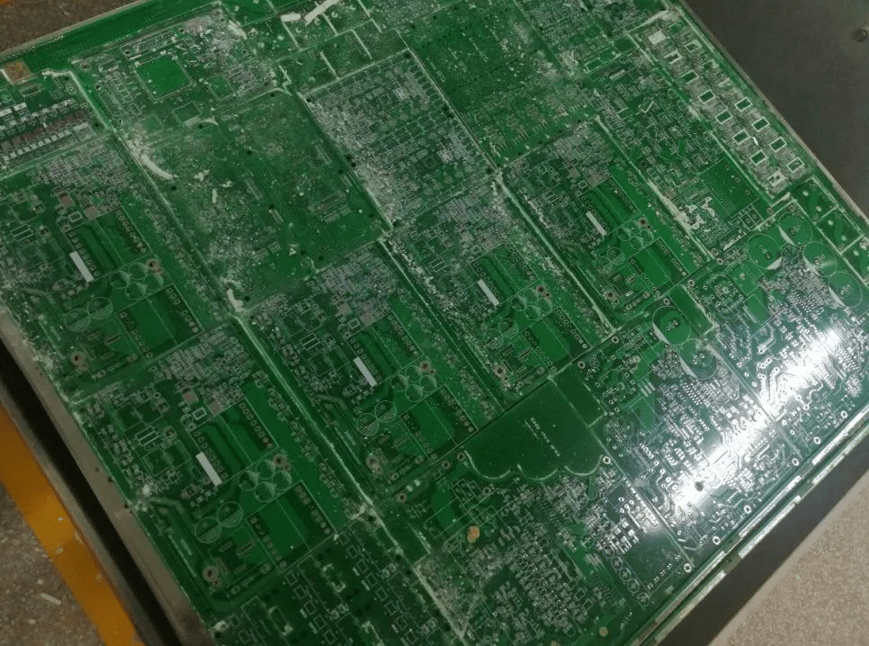 Figure 11-4. The circuit board after routing; There are many debris on the board