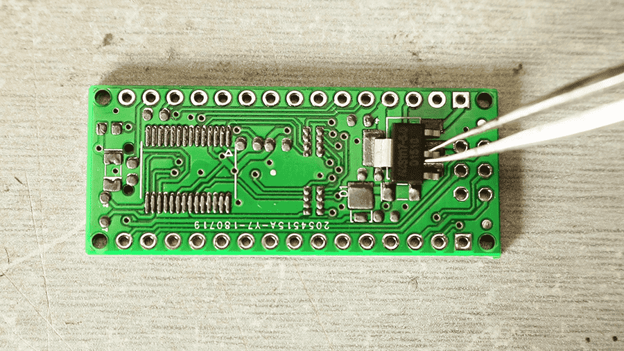 Use tweezers to place the component on the PCB board